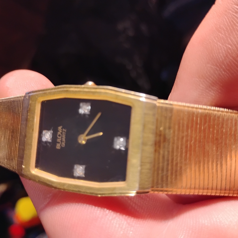Bulova Gold and Black Quartz Watch